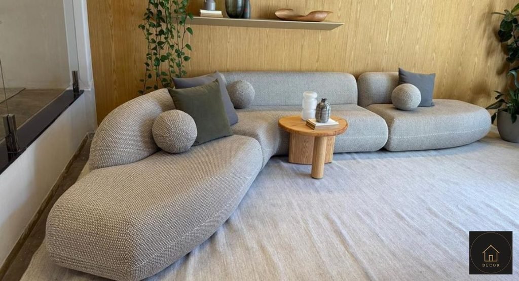 V-Shaped Sectional Sofa: Complete Guide to Size, Layout & Buying Tips modern living room with a large v shaped sectional sofa